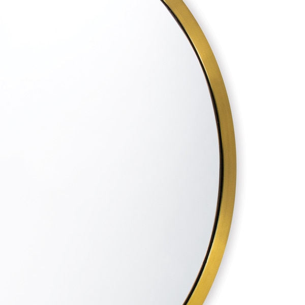 Left side of a round brass mirror